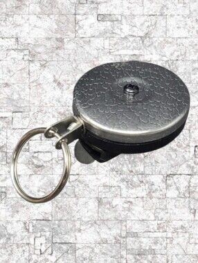 NEW- KEY-BAK ORIGINAL CHROME AND BLACK RETRACTABLE KEY HOLDER - U.S.A.